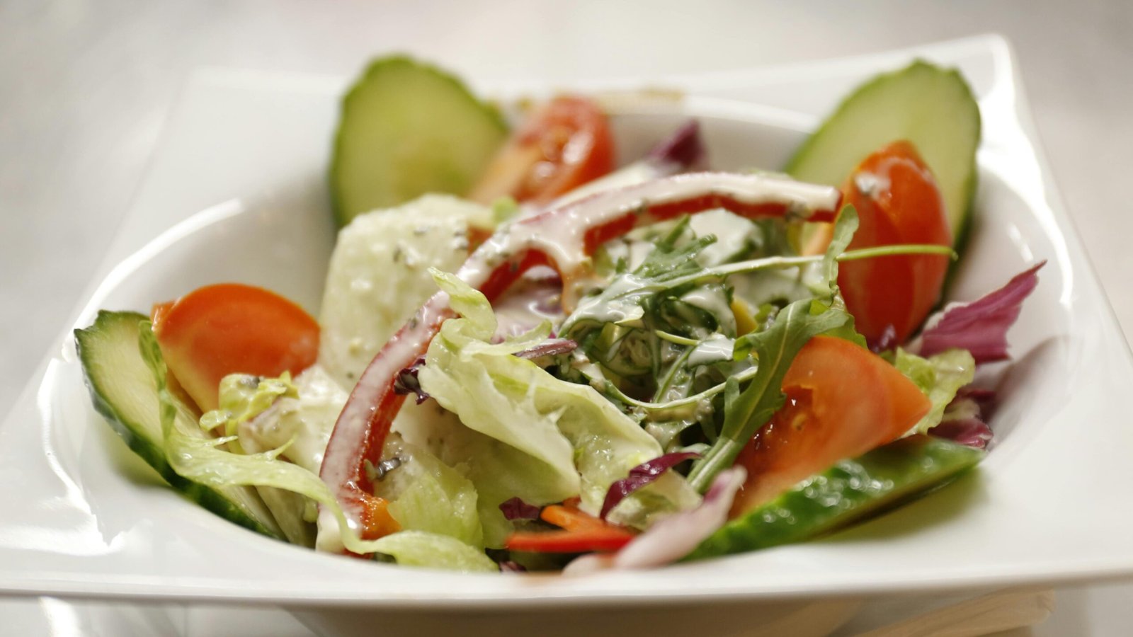 A colorful salad bowl made from organic veggie edited scaled